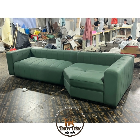 Sofa kê góc màu xanh cho khách e ạ